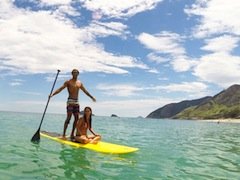 Stand up paddle rio surfcamp surf'n'stay rio surf camp summer retreats for adults lessons children teen young adult best nomad kid bali canggu beginners uluwatu france moliets portugal algarve lisbon