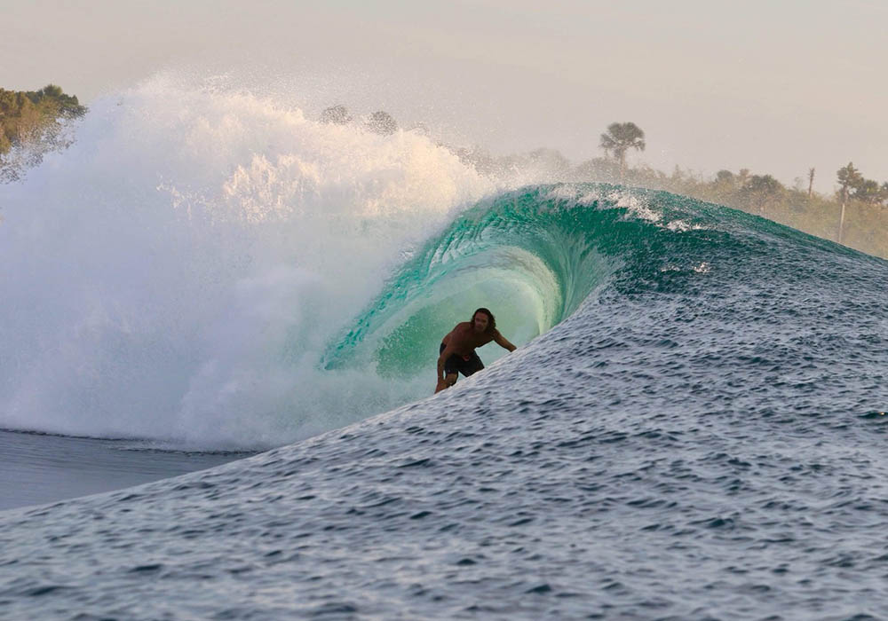 Surfing in G-Land in Indonesia