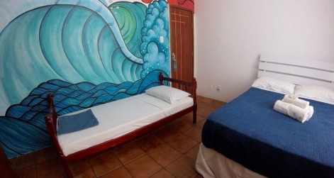 twin bedroom accommodation surf'n'stay rio surf camp summer retreats for adults lessons children teen young adult best nomad kid bali canggu beginners uluwatu france moliets portugal algarve lisbon