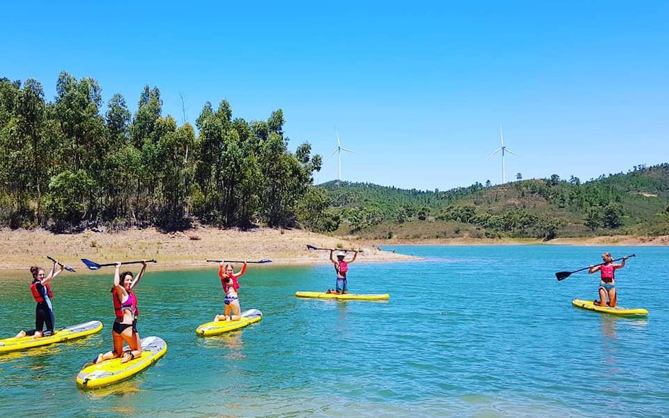 kayaking nomad surf camp - young adults 18 - 21 years old, algarve, portugal retreats for adults surf camp lessons children teen summer young adult best nomad kid bali canggu beginners uluwatu france moliets lisbon