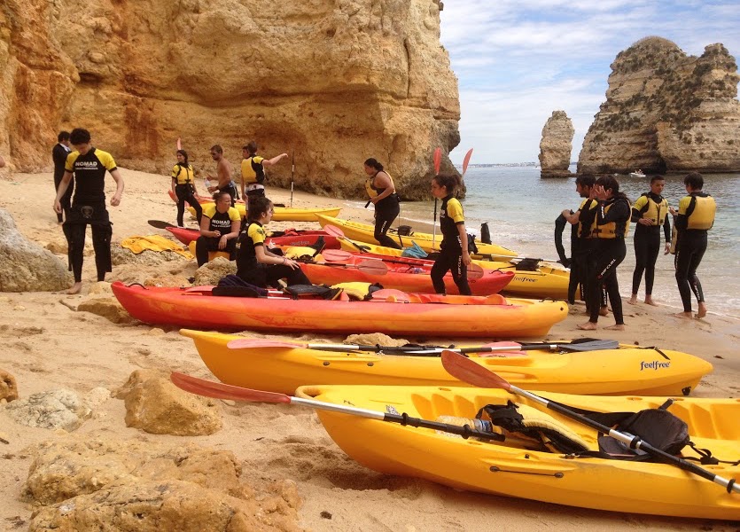 kayaking nomad surf camp - young adults 18 - 21 years old, algarve, portugal retreats for adults surf camp lessons children teen summer young adult best nomad kid bali canggu beginners uluwatu france moliets lisbon 2