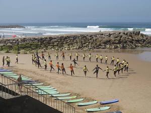 surf stretching 2 nomad surf camp - young adults - lisbon - erasmus - university students retreats for adults surf camp lessons children teen summer young adult best nomad kid bali canggu beginners uluwatu france moliets portugal algarve