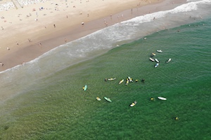 beahc aerial view nomad surf camp - young adults - lisbon - erasmus - university students retreats for adults surf camp lessons children teen summer young adult best nomad kid bali canggu beginners uluwatu france moliets portugal algarve