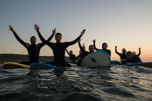 paddle lesson nomad surf camp - young adults - cantabria retreats for adults surf camp lessons summer young adult best nomad kid bali canggu beginners uluwatu france moliets portugal algarve lisbon