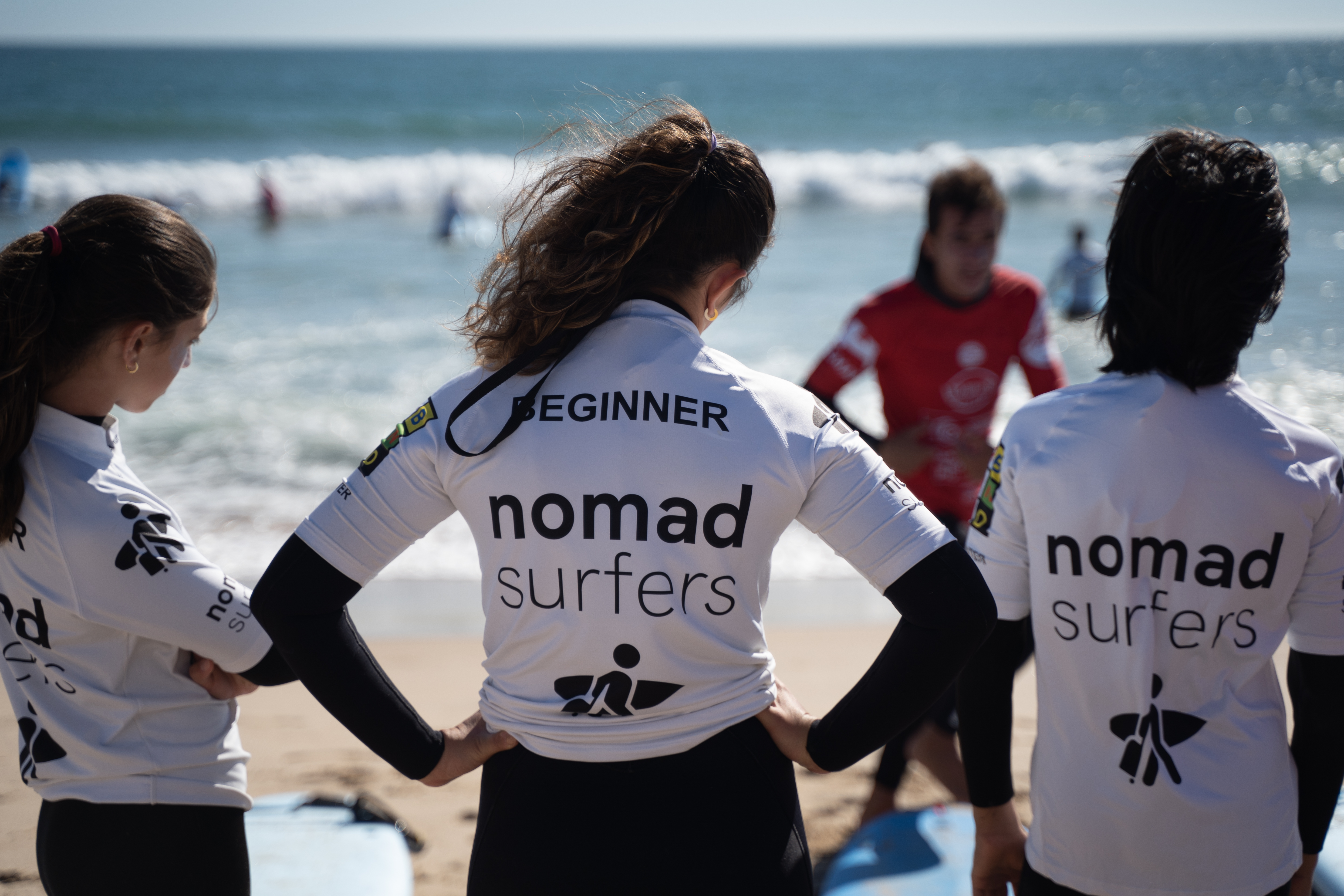 nomad surfers student nomad surf camp - young adults - lisbon - erasmus - university students retreats for adults surf camp lessons children teen summer young adult best nomad kid bali canggu beginners uluwatu france moliets portugal algarve