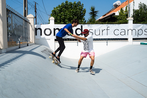 learn skate boarding nomad surf camp - young adults - lisbon - erasmus - university students retreats for adults surf camp lessons children teen summer young adult best nomad kid bali canggu beginners uluwatu france moliets portugal algarve